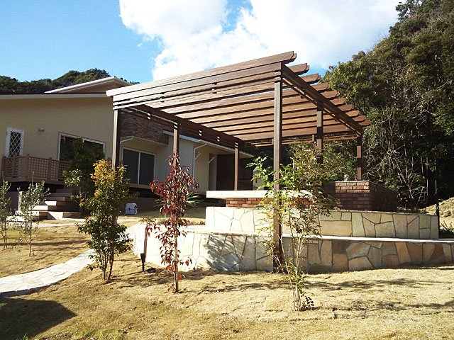 Pergola and Tile Terrace at Large Lawn Garden